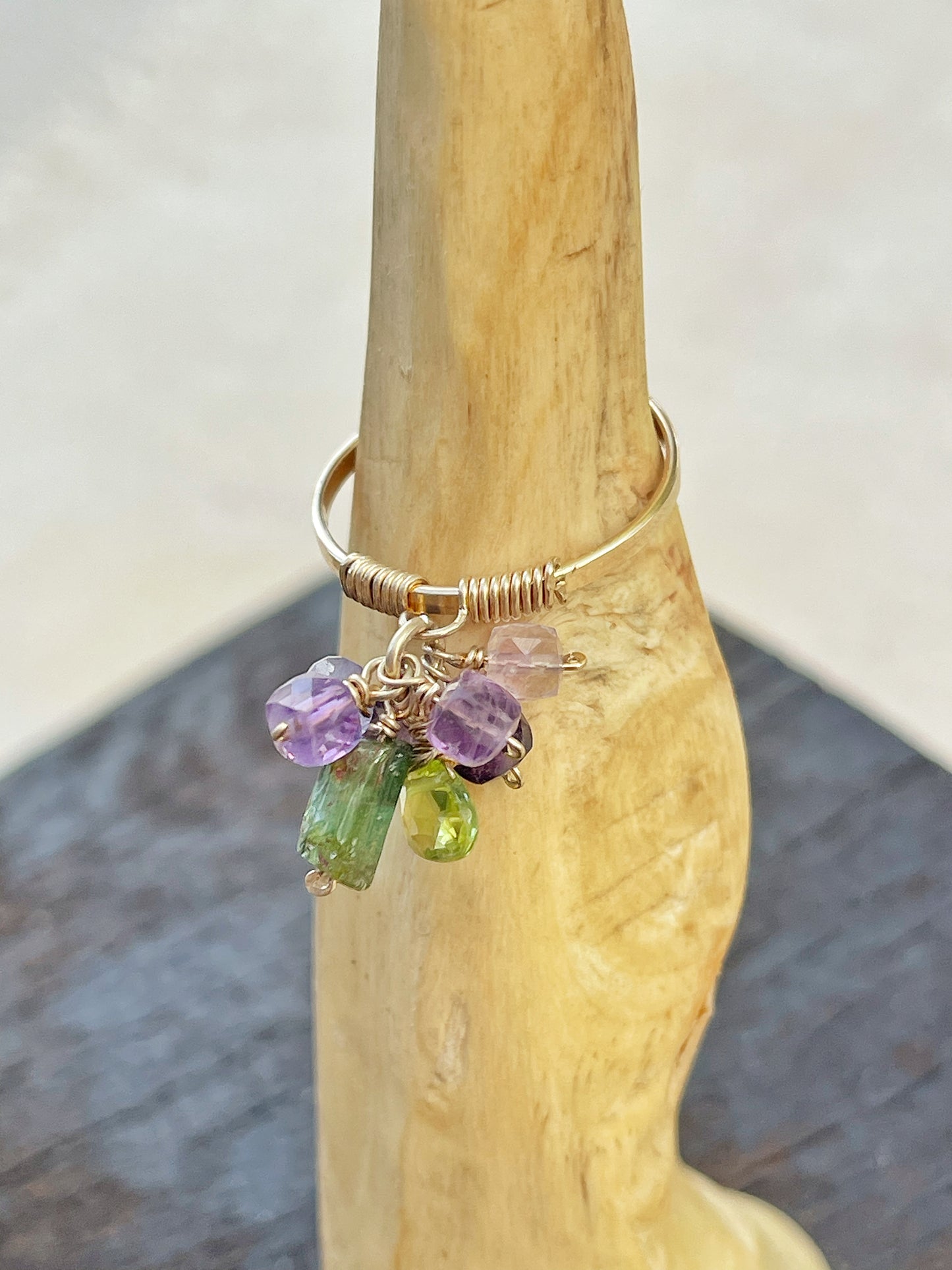 Open ring with gemstone pendant