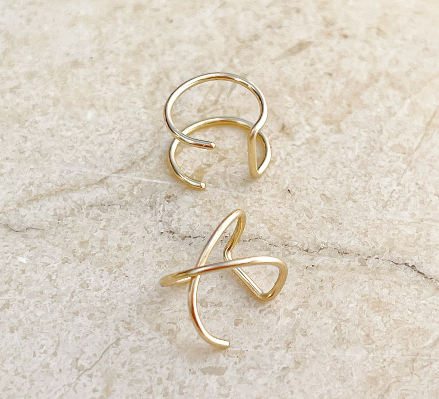 A pair of minimalist caps
