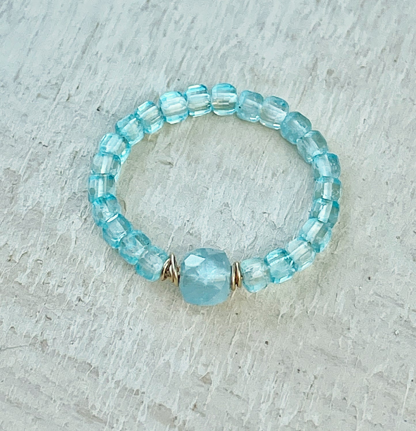 Delicate blue topaz and aquamarine ring