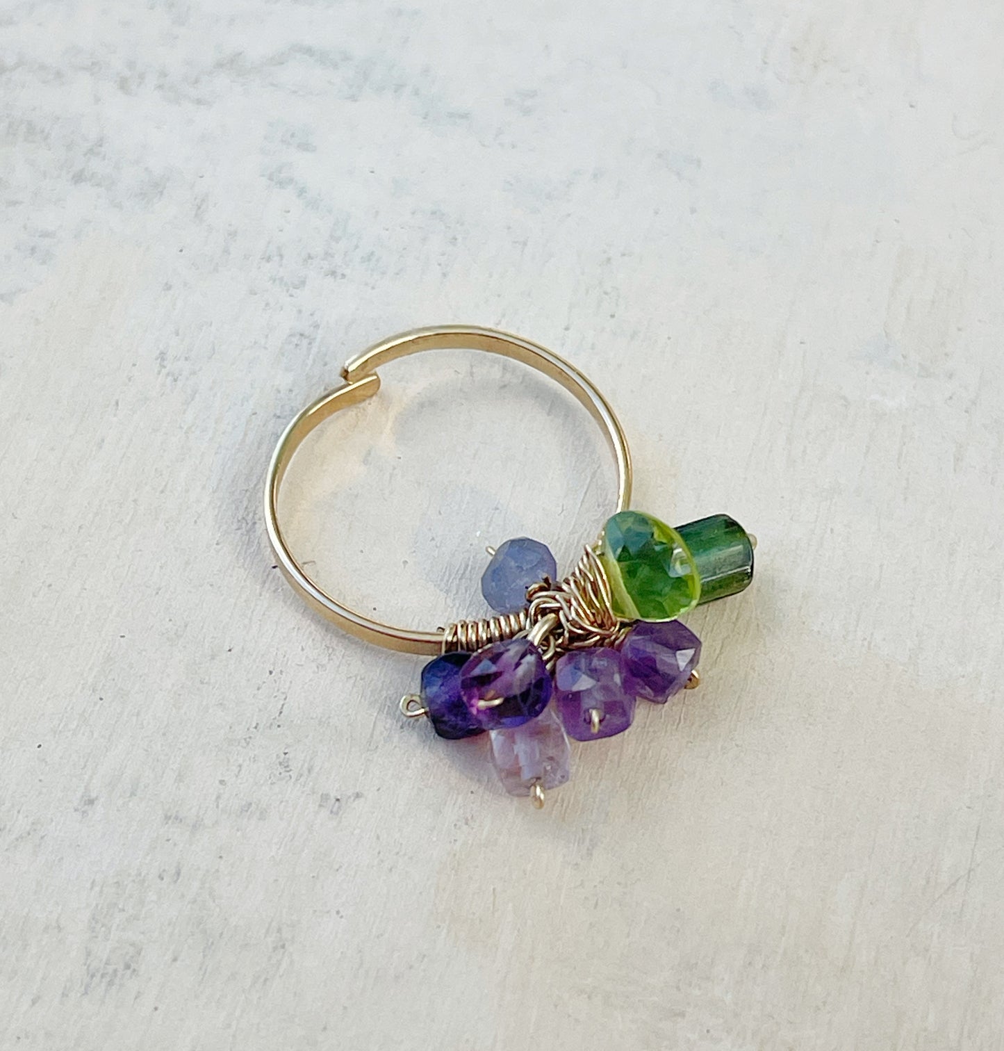Open ring with gemstone pendant