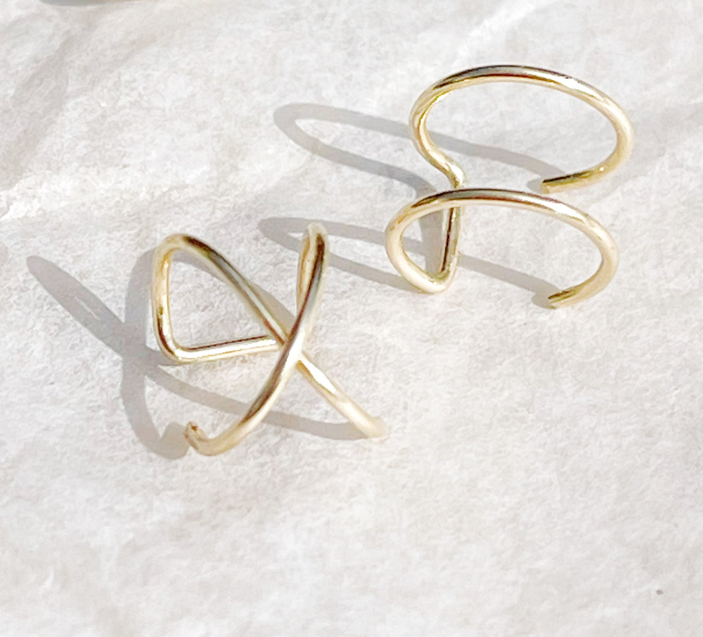 A pair of minimalist caps