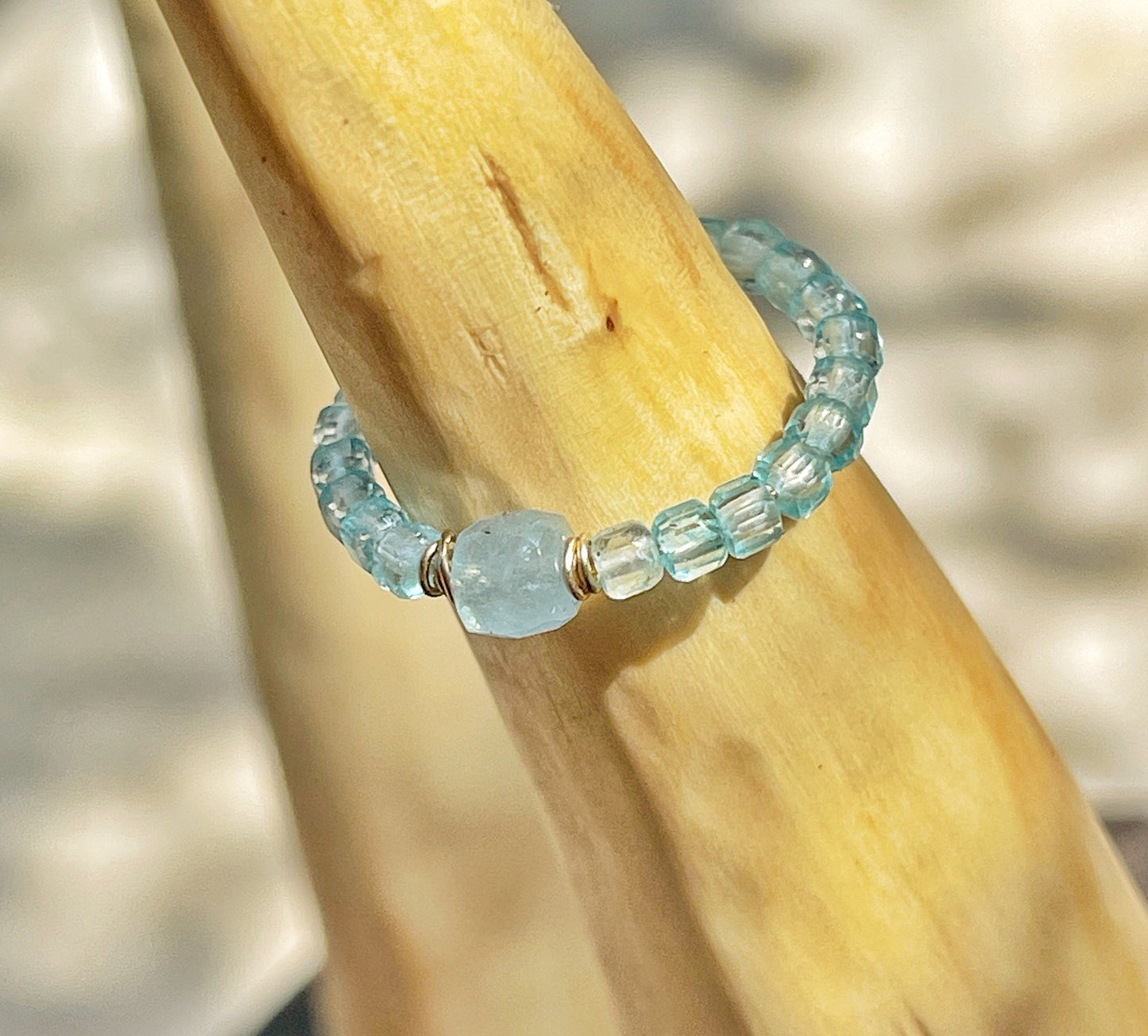 Delicate blue topaz and aquamarine ring