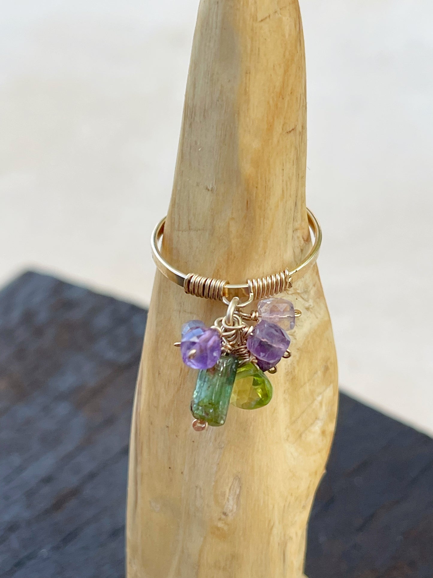 Open ring with gemstone pendant