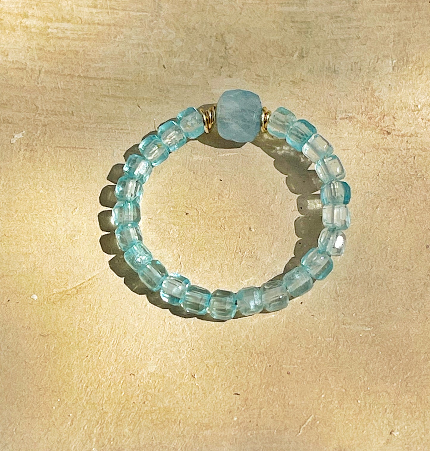 Delicate blue topaz and aquamarine ring