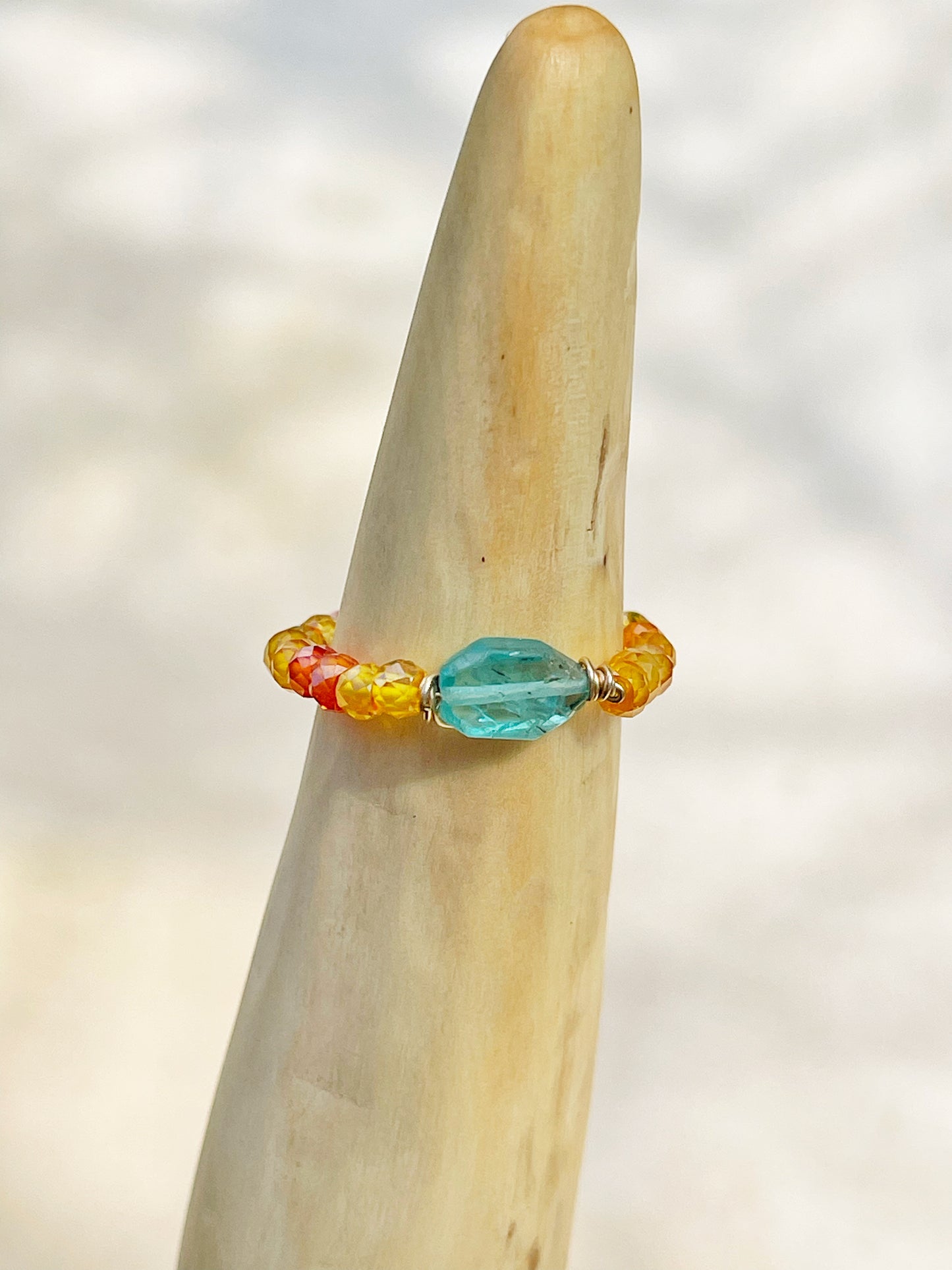 Delicate ring with colored zircon and natural apatite